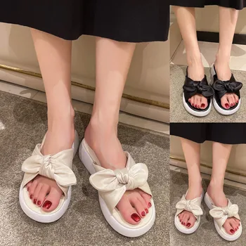 Дамски обувки летни дебели еднолични дамски плажни обувки римски обувки мода лък възел външно износване меки вътрешни чехли за жени